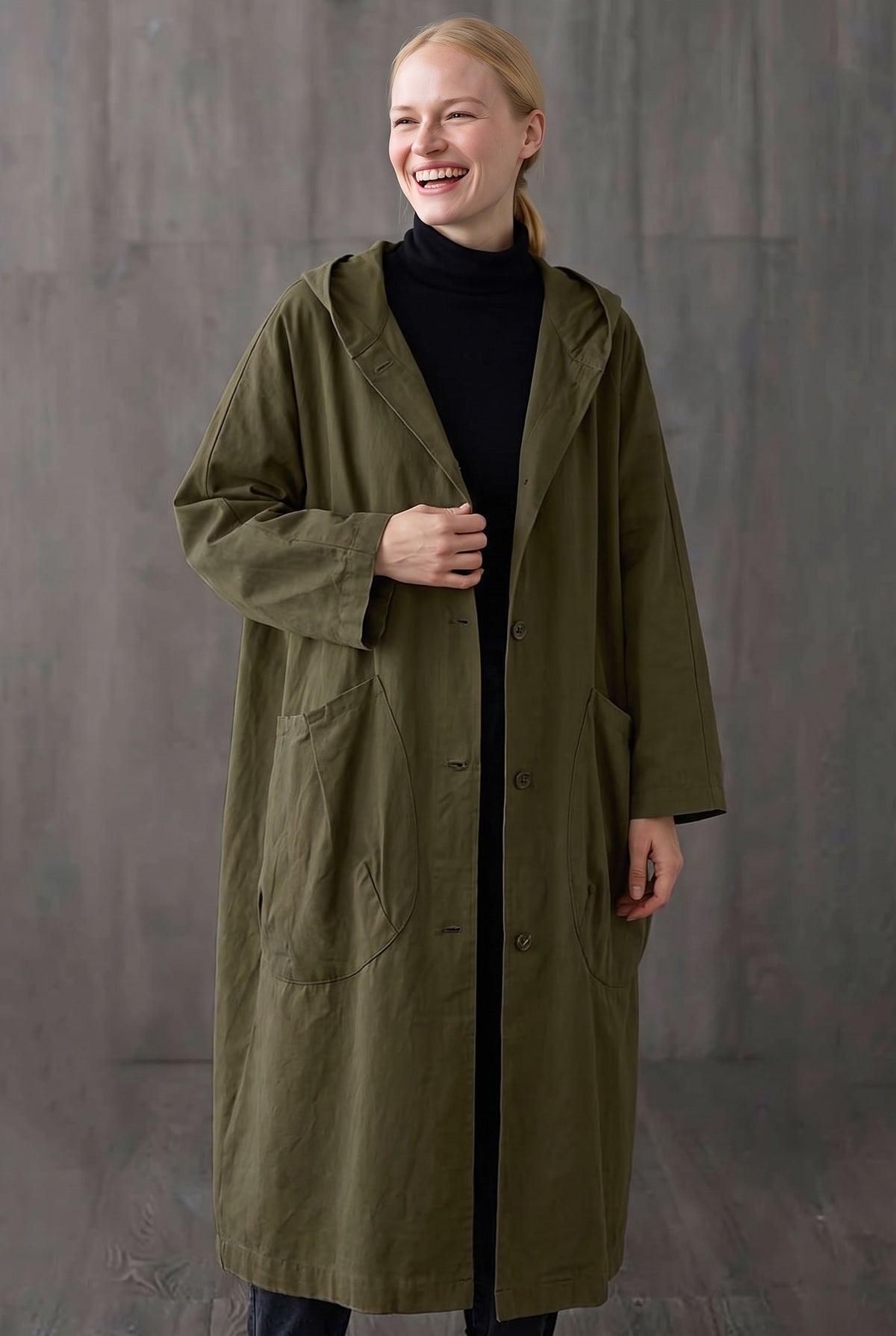 Legergroene lange oversized jas met capuchon en grote zakken | Boutique Moda