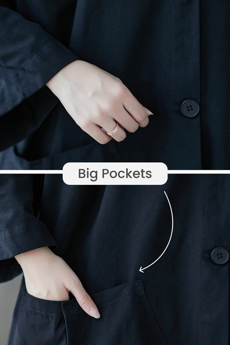 Close-up van de grote zakken op de zwarte jas | Boutique Moda