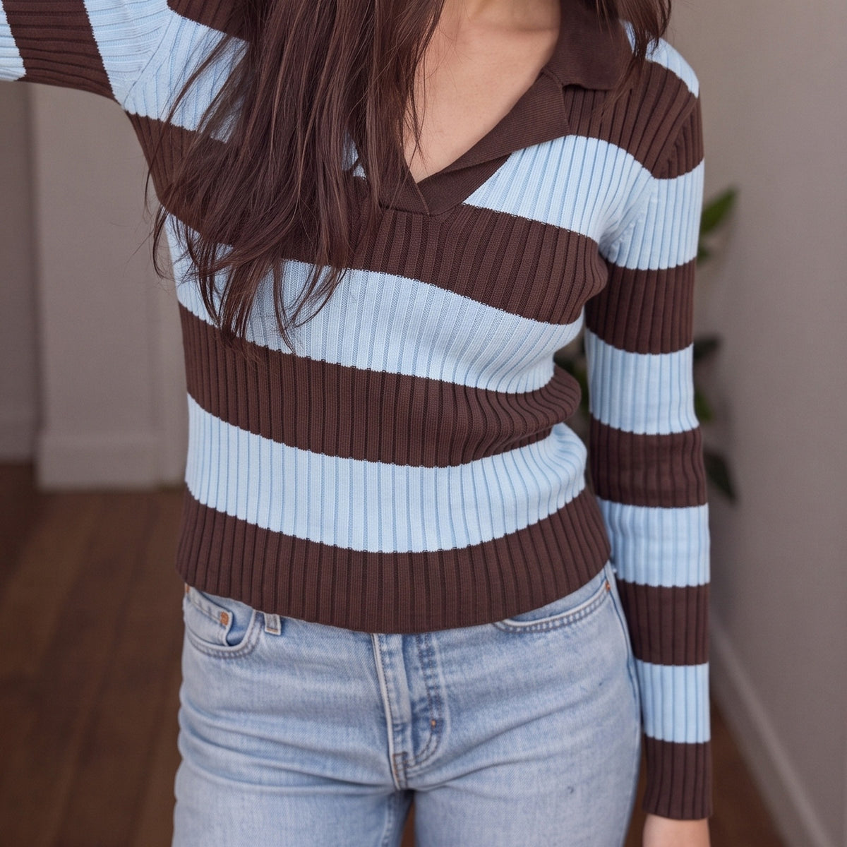 Gestreepte polotrui op een jeans | Boutique Moda