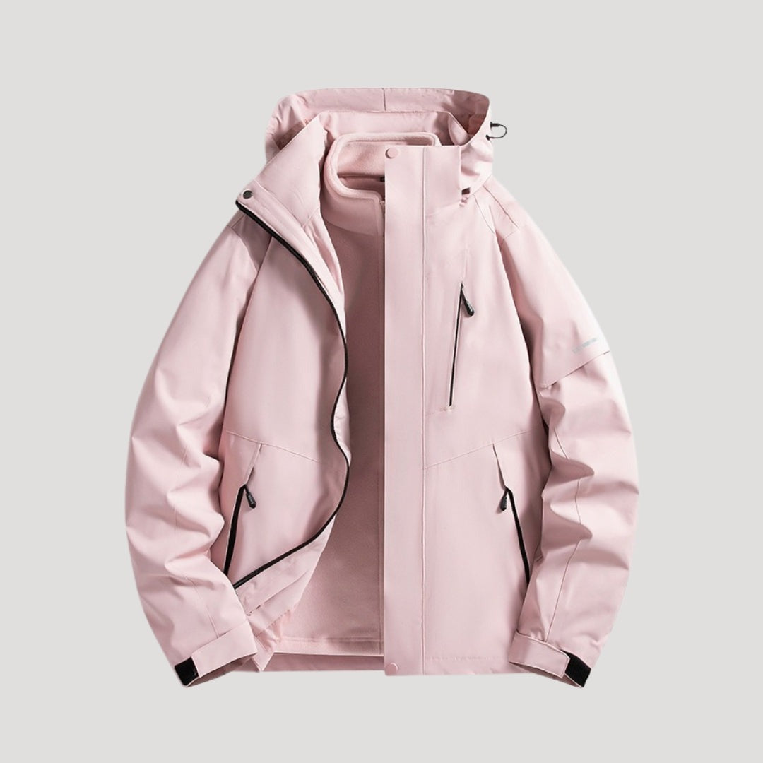 Outdoorjas in roze, waterdicht, met capuchon, tweekleurige panelen en ritszakken | Boutique Moda