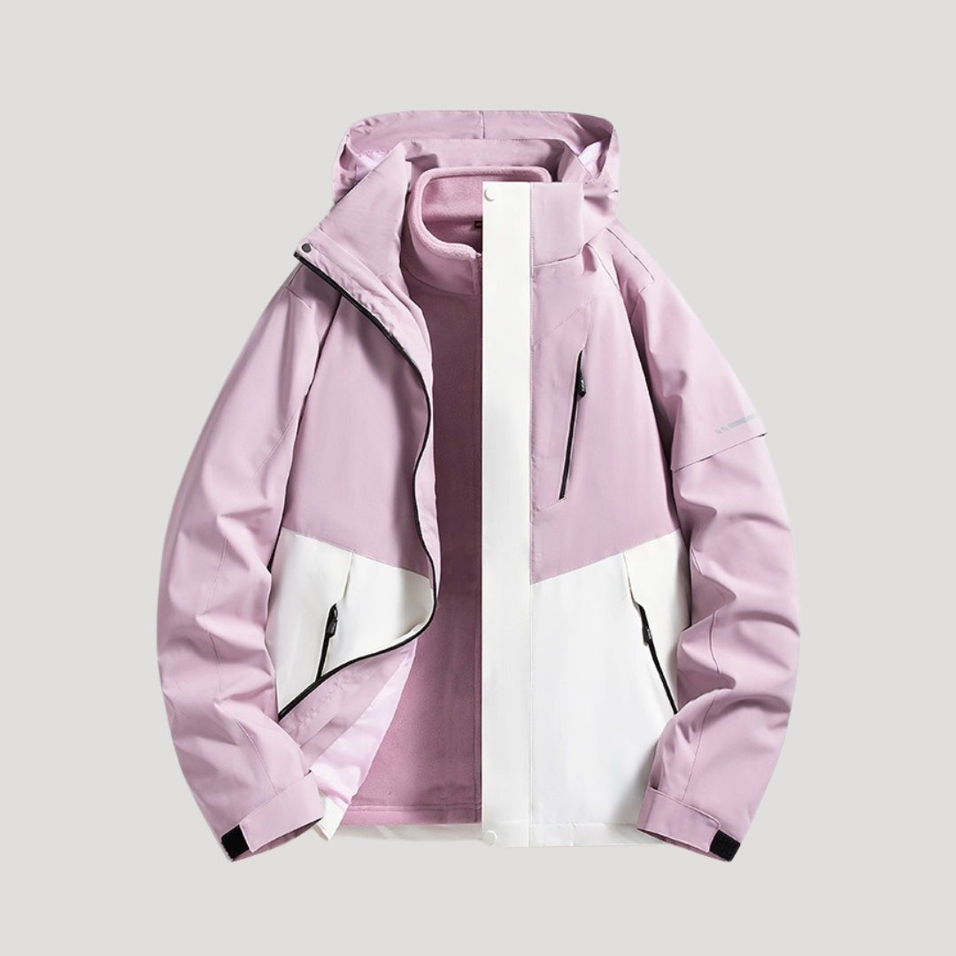 Outdoorjas in lichtlila, waterdicht, met capuchon, tweekleurige panelen en ritszakken | Boutique Moda