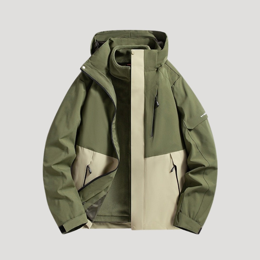 Outdoorjas in bosgroen, waterdicht, met capuchon, tweekleurige panelen en ritszakken | Boutique Moda