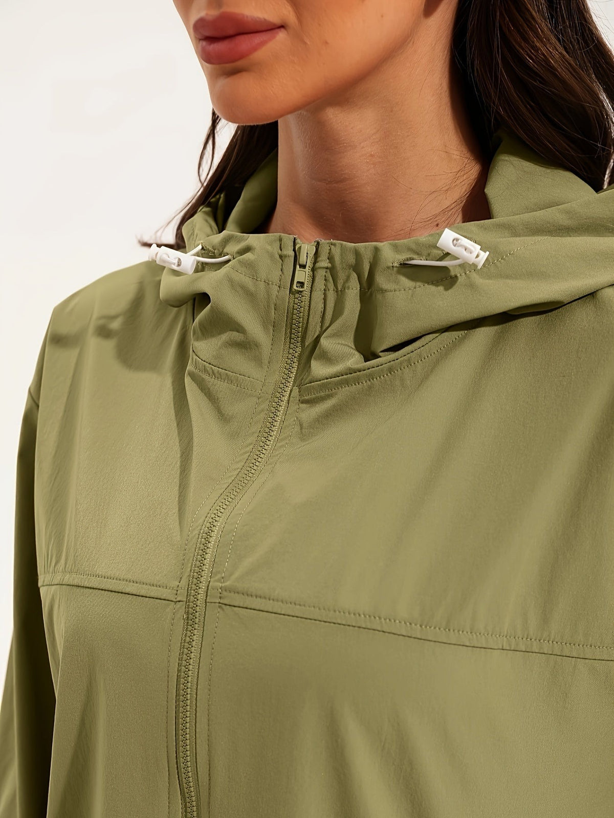 Close-up van het olijfgroene windjack: koord van de capuchon, doorlopende rits en pasnaad | Boutique Moda