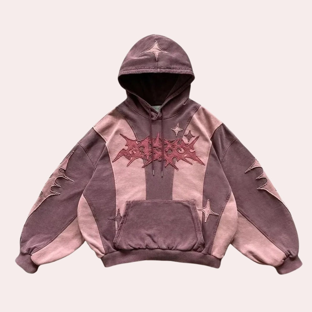 Roze tweekleurige hoodie met sterren en gotisch patchwork, voorkant | Boutique Moda