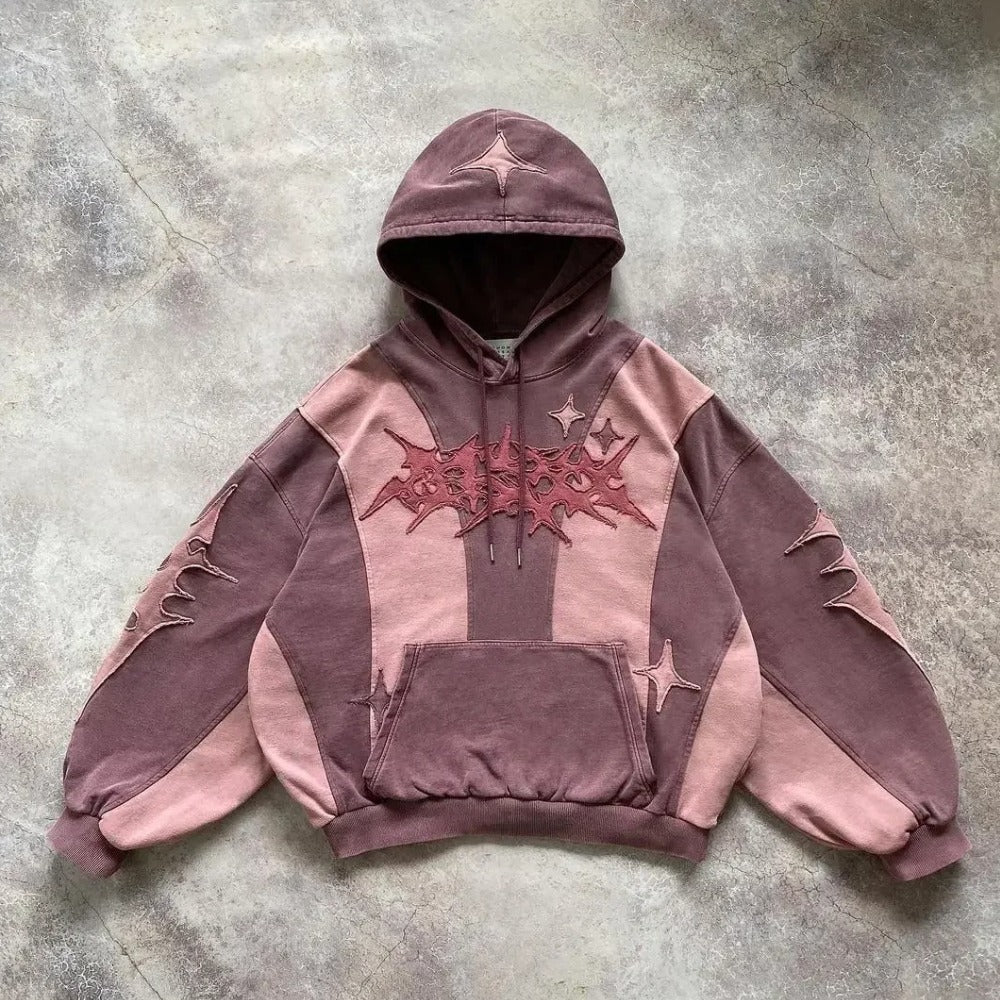 Roze tweekleurige hoodie met sterrenpatchwork, voorkant | Boutique Moda