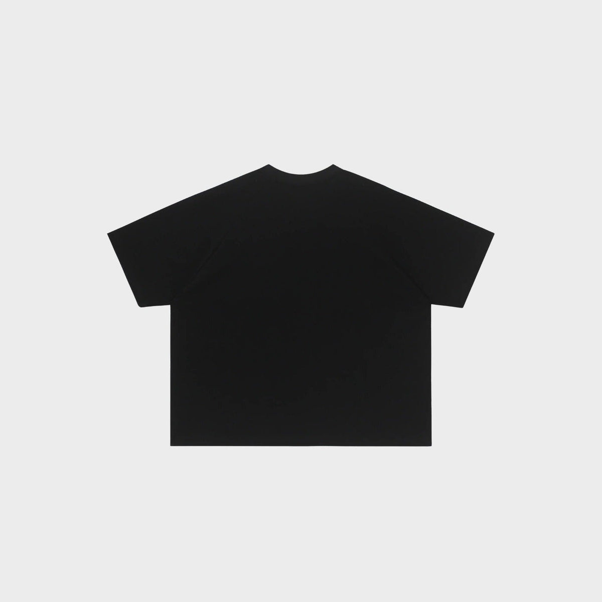 Zwart oversized T-shirt, achteraanzicht plat getoond, effen kleur | Boutique Moda
