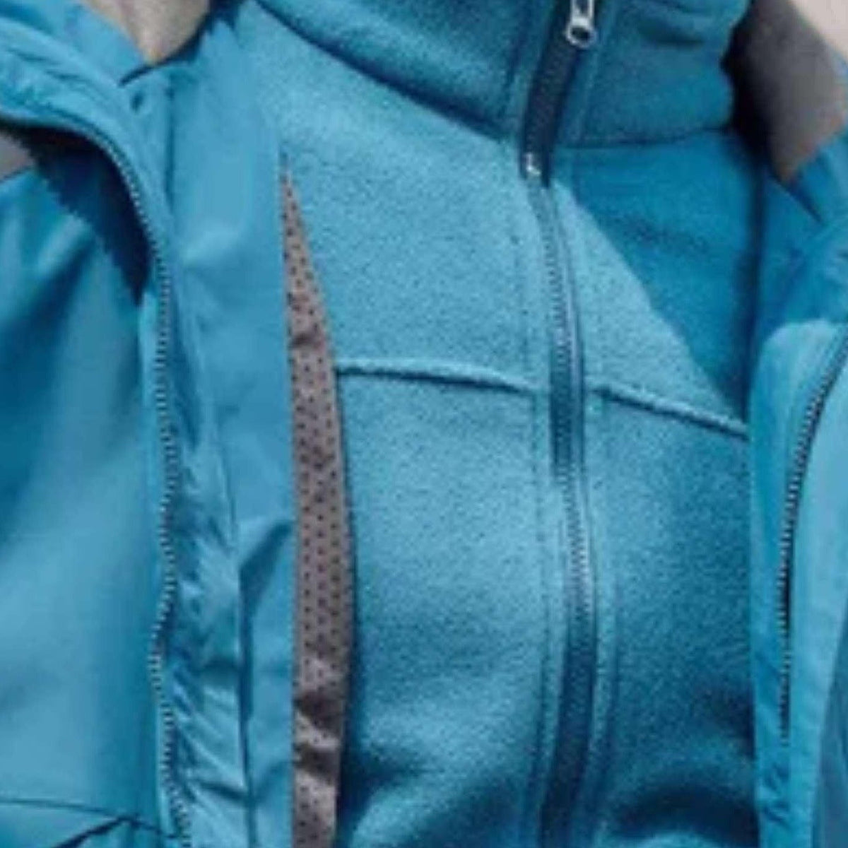 Blauwe fleece binnenjas met rits, close-up van stof en ritsdetail | Boutique Moda