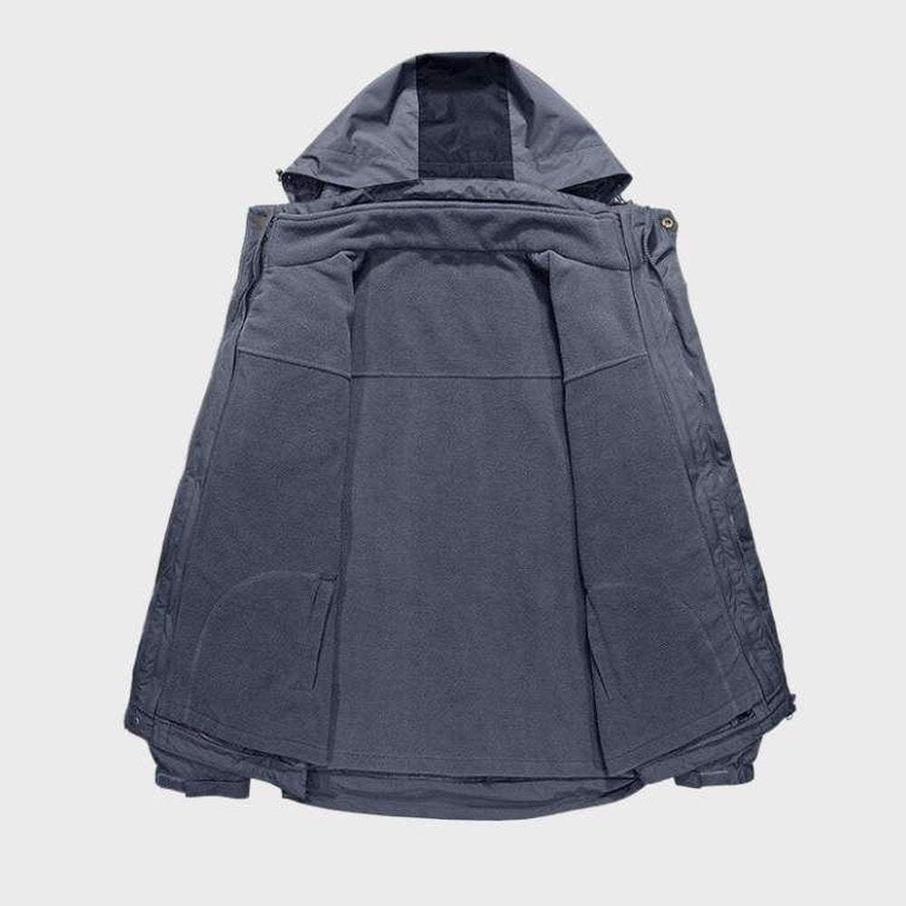 Donkergrijze wandeljas met capuchon, opengevouwen plat getoond, zacht fleecemateriaal zichtbaar | Boutique Moda