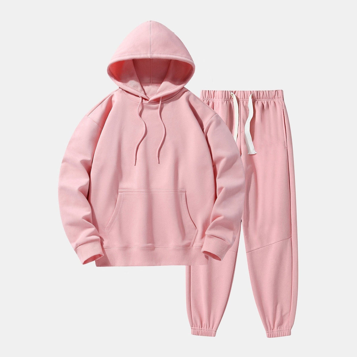 Roze hoodie met joggingbroek, effen kleur, plat gefotografeerd op witte achtergrond | Boutique Moda
