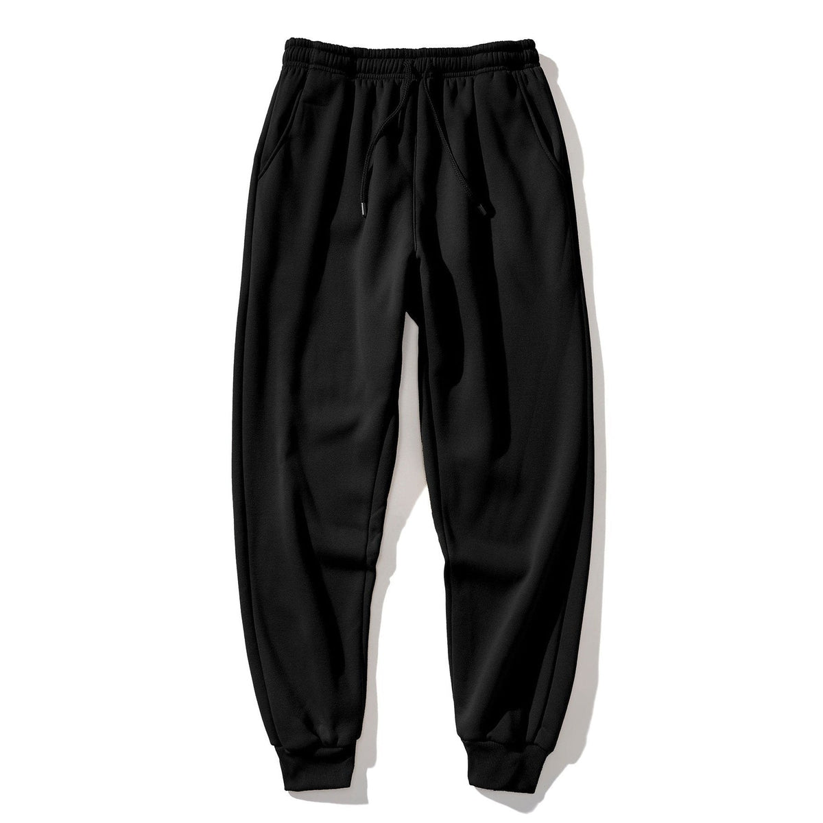 Zwarte joggingbroek met boord, plat liggend gefotografeerd, geen persoon zichtbaar | Boutique Moda
