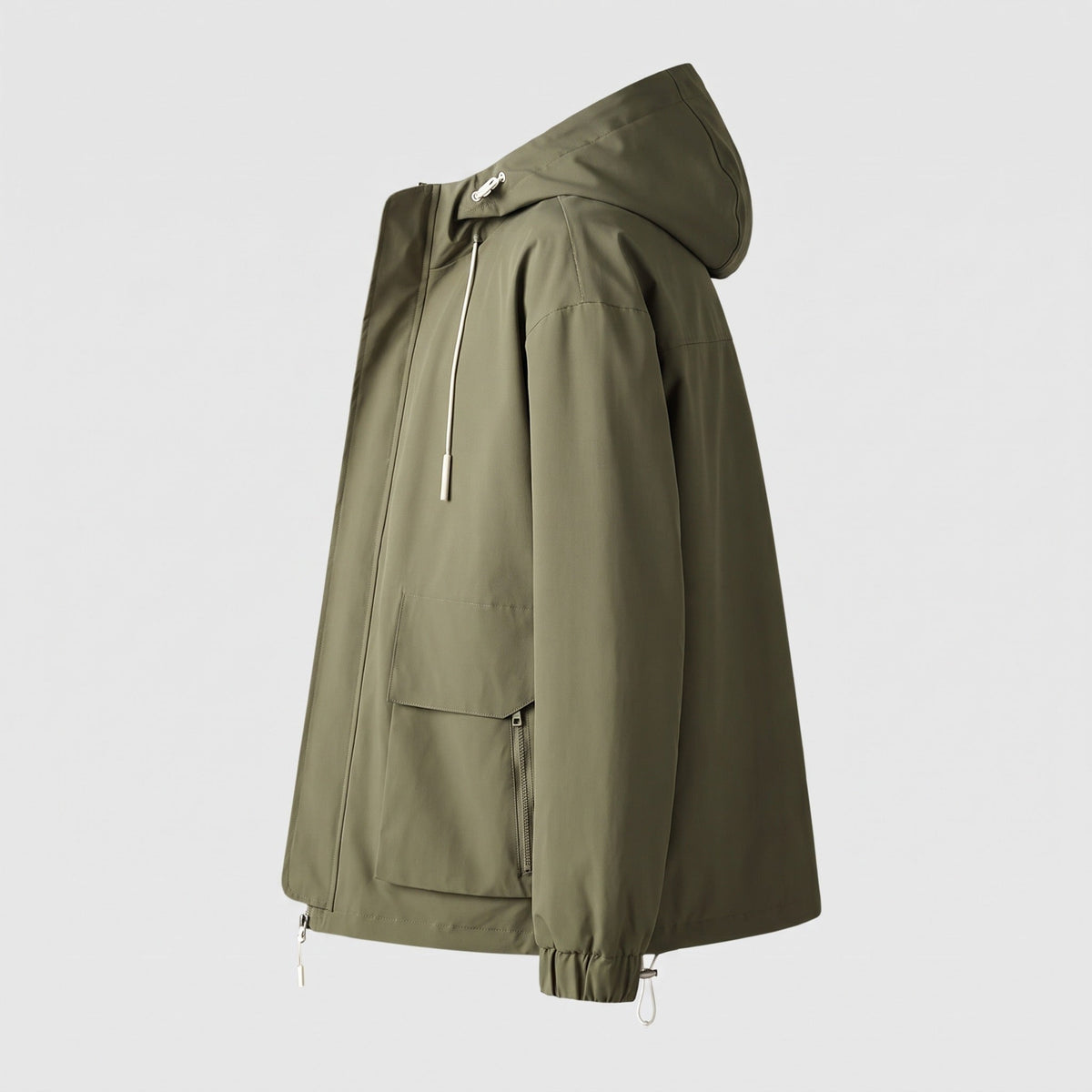 Groen windjack met capuchon, zijaanzicht, getoond op paspop | Boutique Moda
