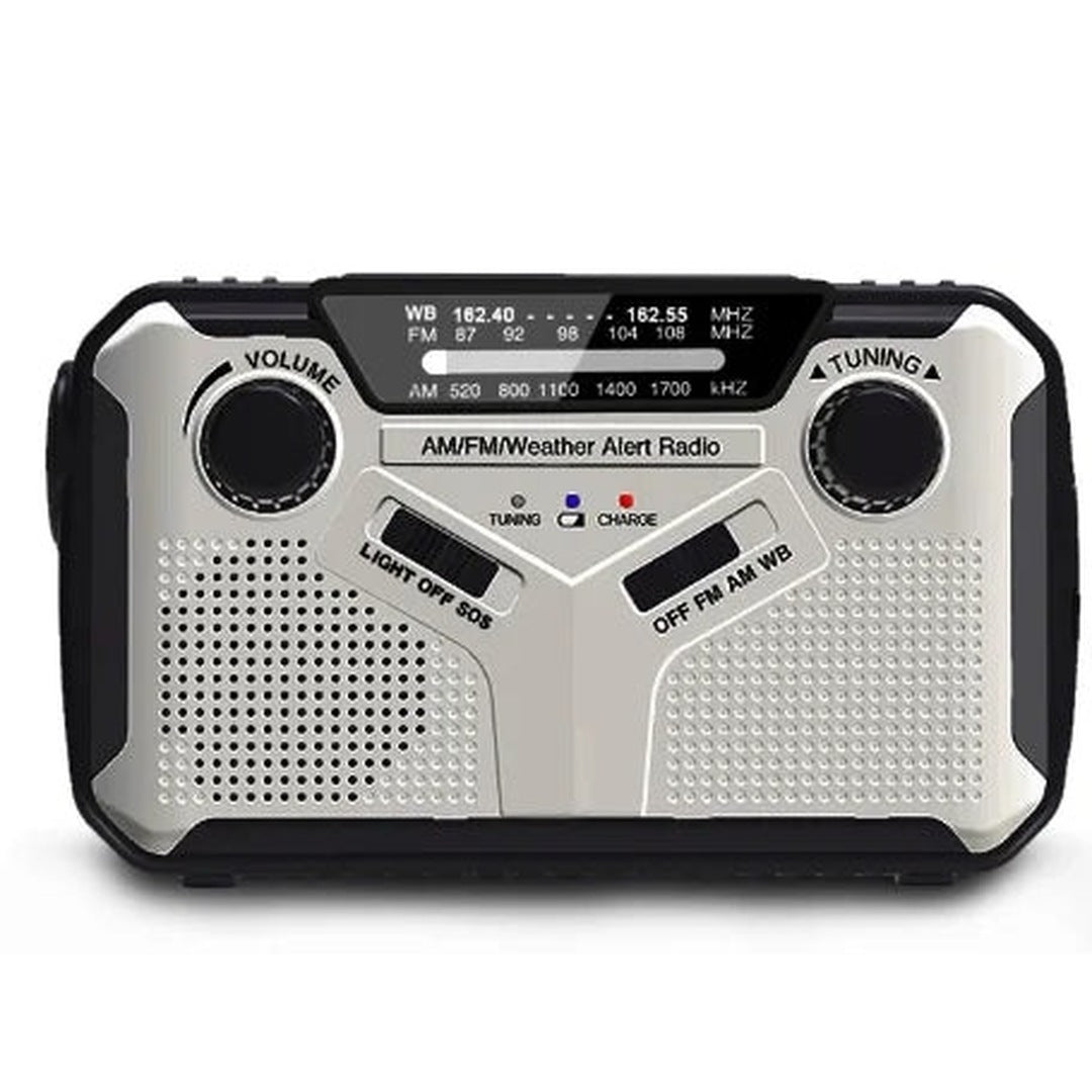 Zwart-zilveren noodradio met volumeknop, afstemknop en luidsprekerrooster, los afgebeeld | Boutique Moda