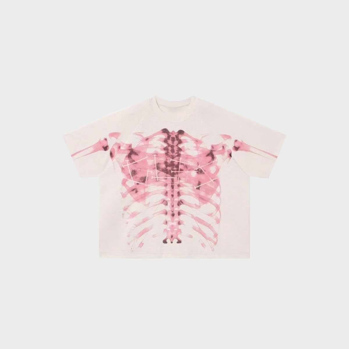 Lichtroze oversized T-shirt met ribbenkast röntgenprint, plat gefotografeerd | Boutique Moda