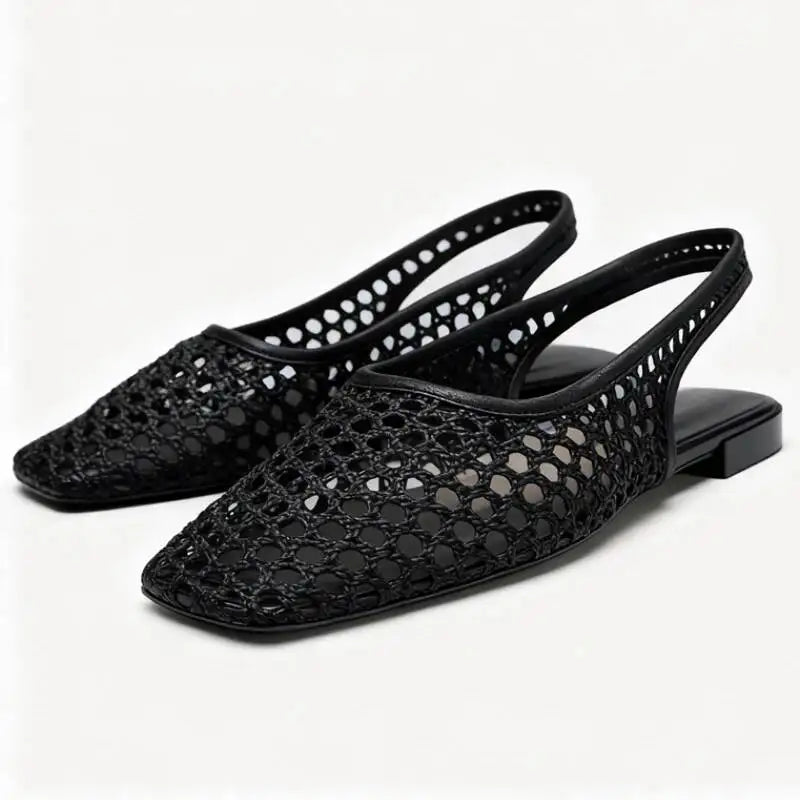 Zwarte opengewerkte slingback-ballerina's